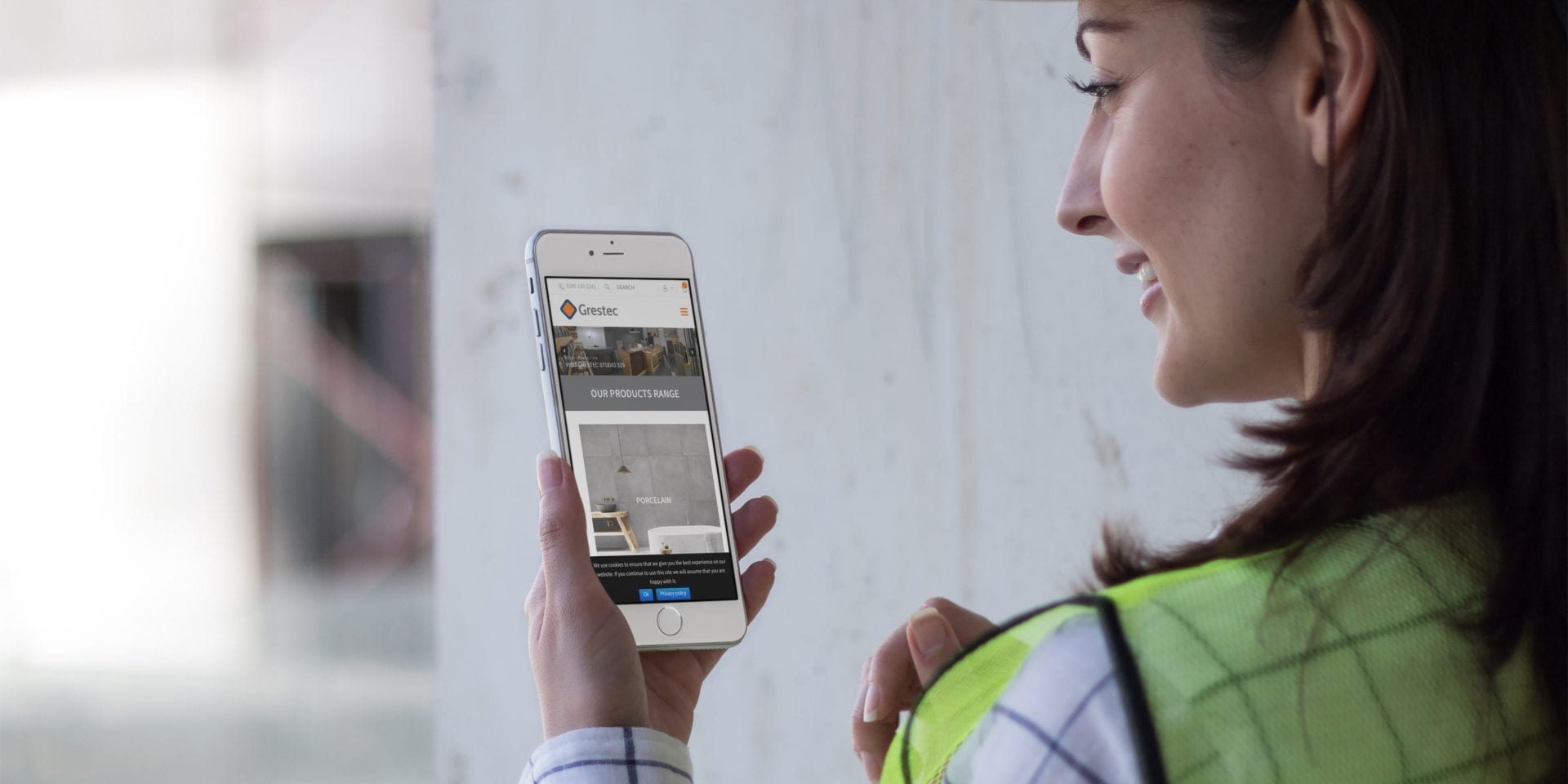 iphone-mockup-in-portrait-position-of-a-woman-architect-at-the-site-a12579 Tile web design